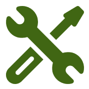 Green wrench and screwdriver on black background.